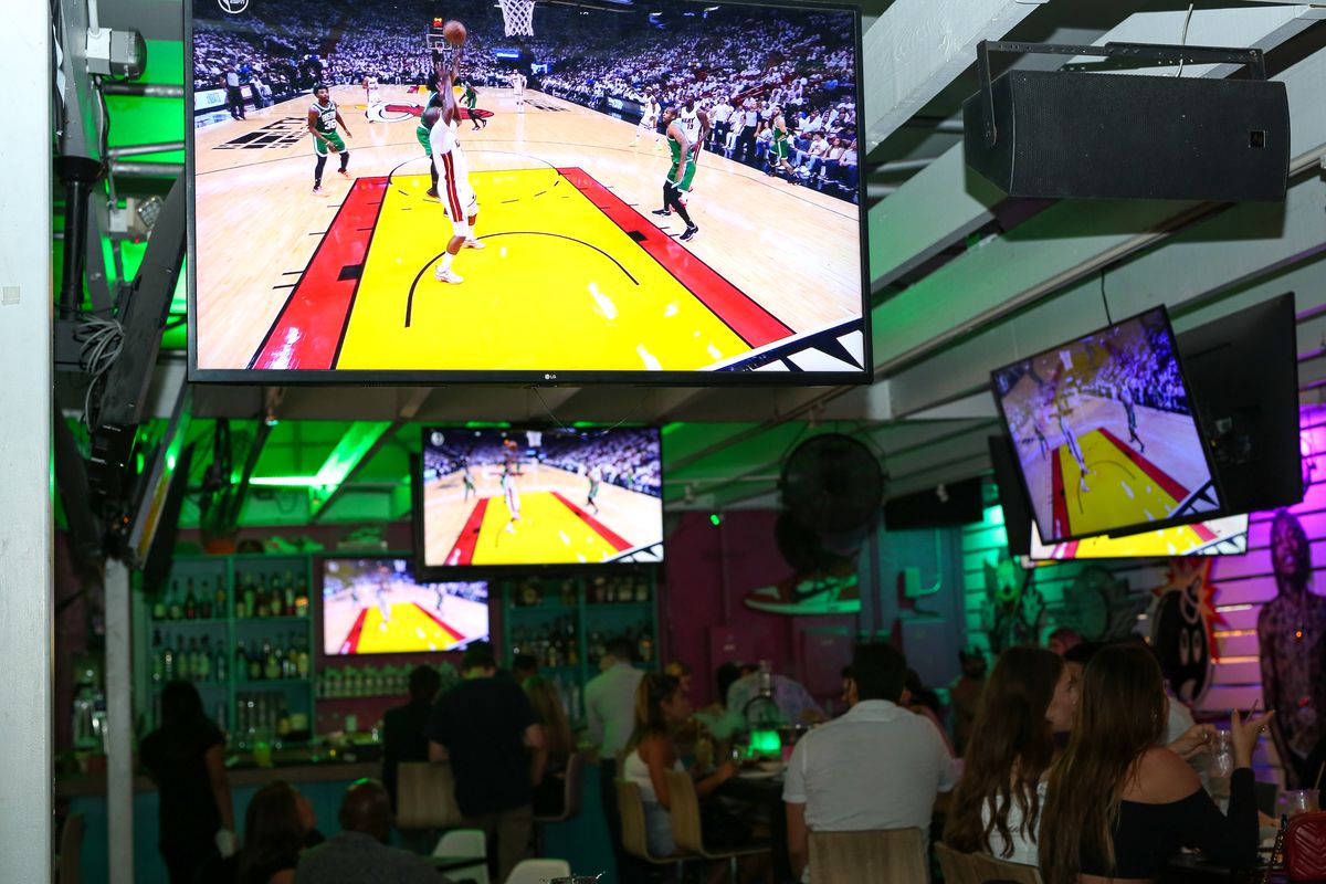 Miami Heat vs Boston Celtics broadcast on the big screen at Grails Miami, Miami's home Heat sports bar