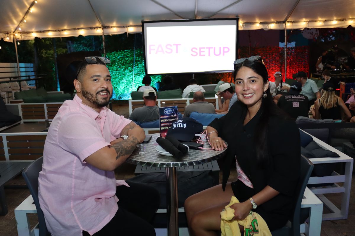 Couple at outdoor patio table at Grails Miami
