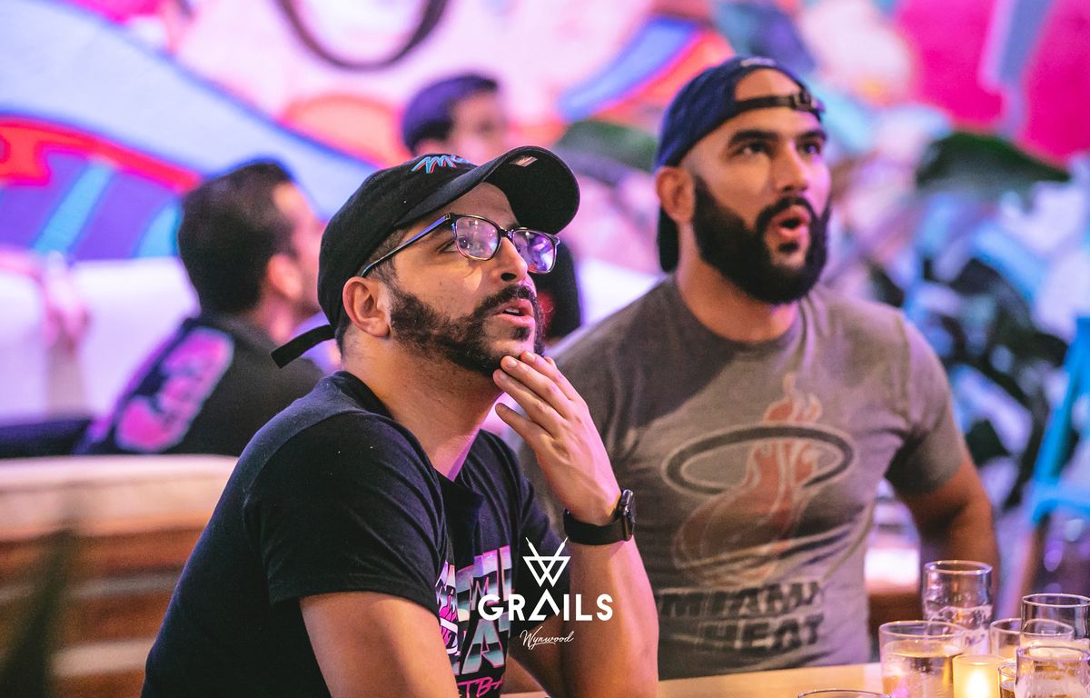 Miami Heat fans watching the game at Grails Miami