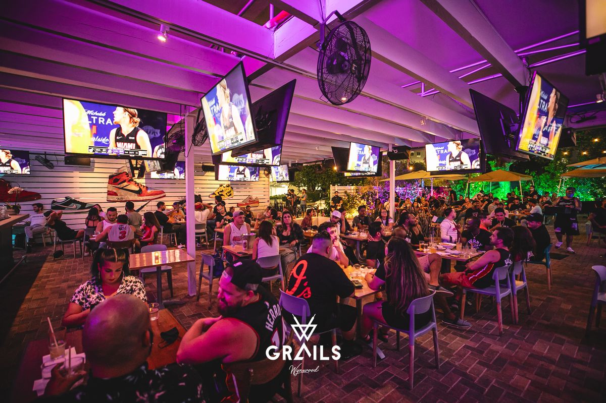 Miami Heat fans packing the patio at Grails Miami, the home Miami Heat watch party bar in Wynwood