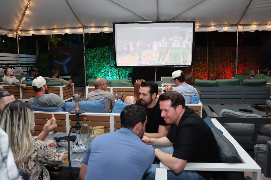 NBA Game 7 watch party under the Yard tent with hookah and projector at Grails Wynwood — sports + hookah in Miami